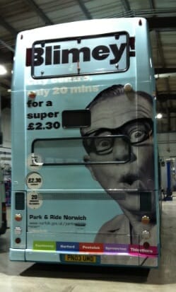 Bus wrapped with a man saying Blimey